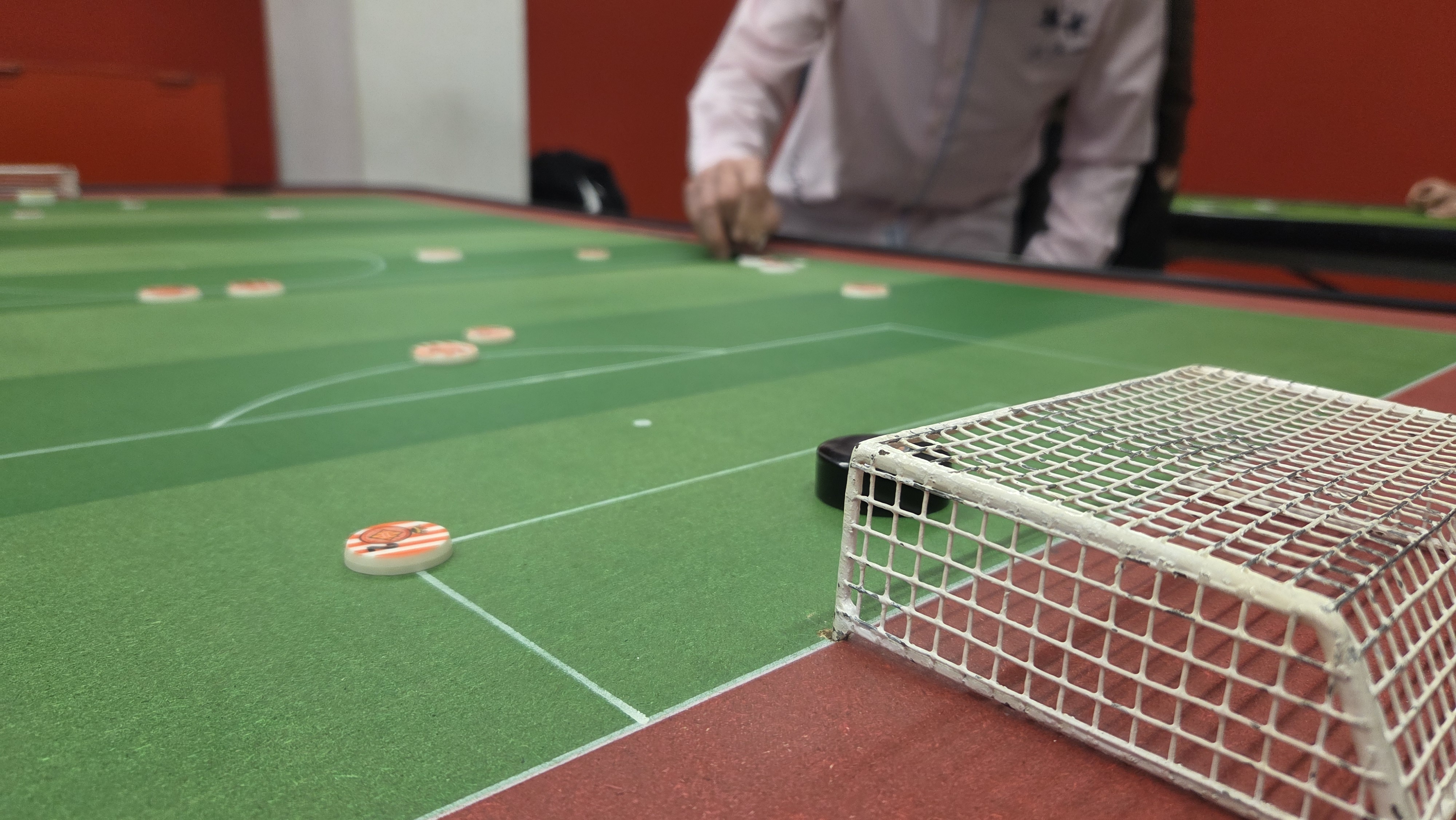 Composició de camp, botons i pilota